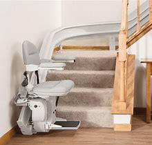 Curved stair lift